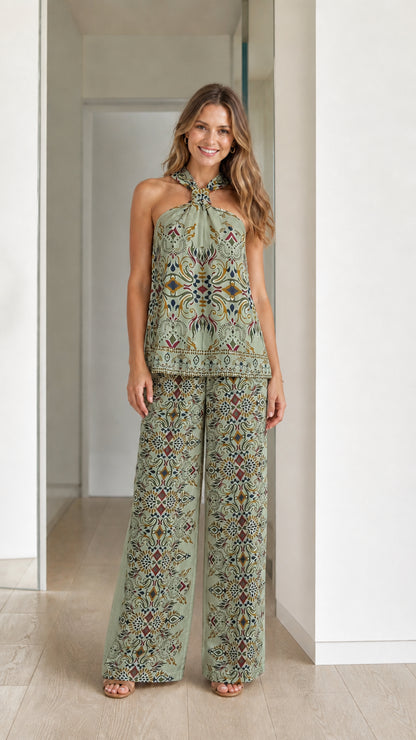 Model wearing sage green boho printed two-piece set