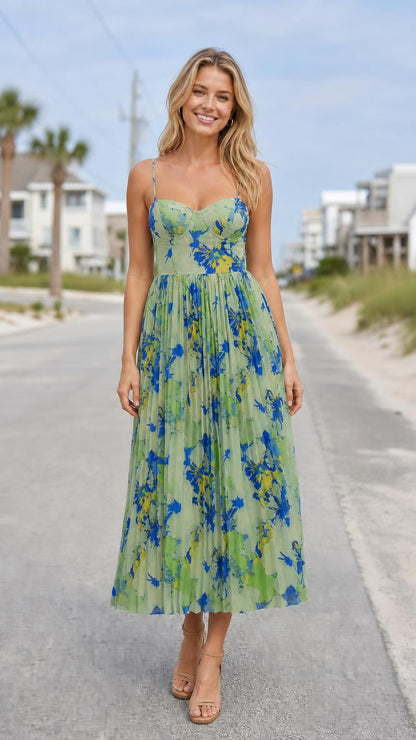 Model wearing green floral print bustier pleated midi dress