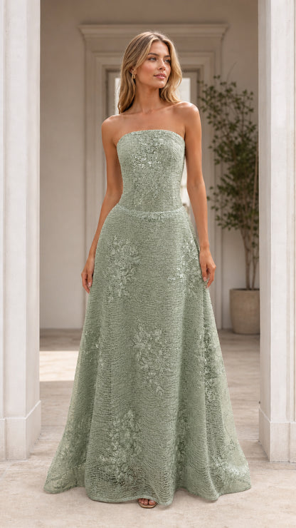 Front view of model wearing sage green strapless formal evening dress