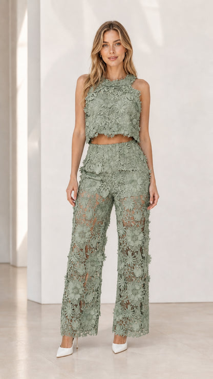 Model wearing sage green floral lace two-piece set