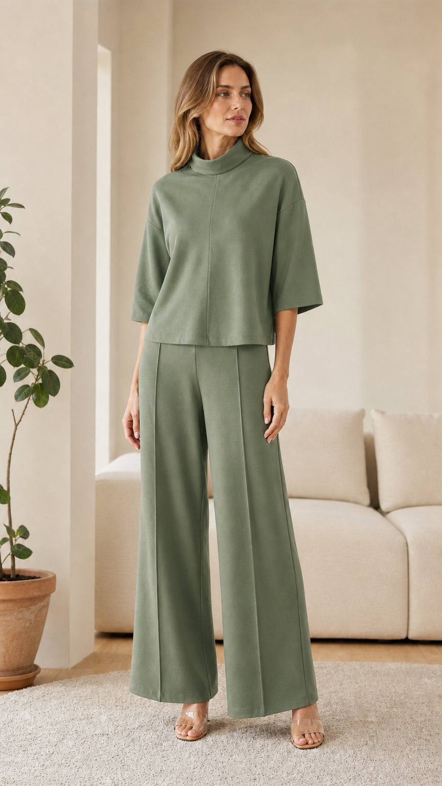Woman wearing sage green matching lounge set