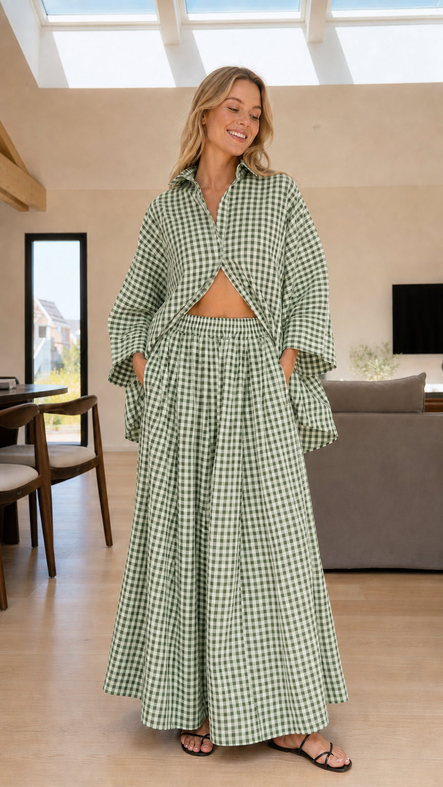 Woman wearing green and white gingham check shirt and wide-leg pants set