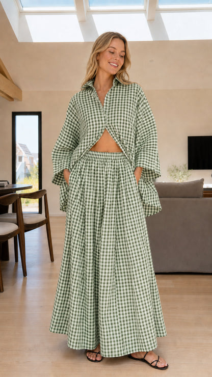 Woman wearing green and white gingham check shirt and wide-leg pants set