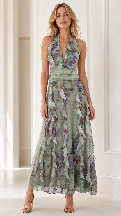 Front view of model wearing sage floral halter ruffle maxi dress