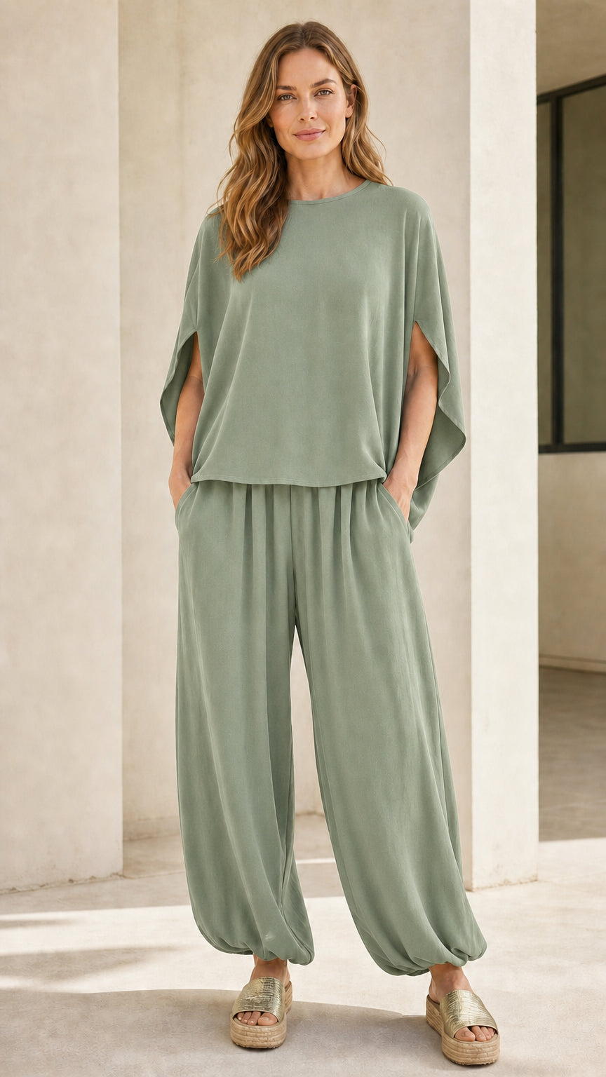 Woman wearing sage green matching two-piece lounge set
