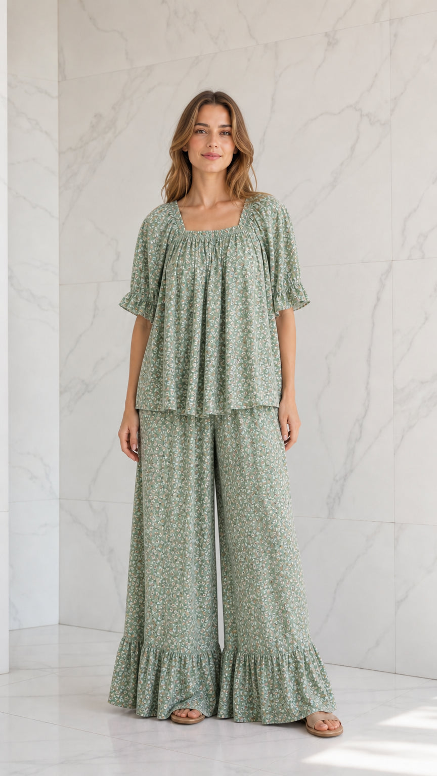 Model wearing sage green ditsy floral two-piece wide-leg pants set