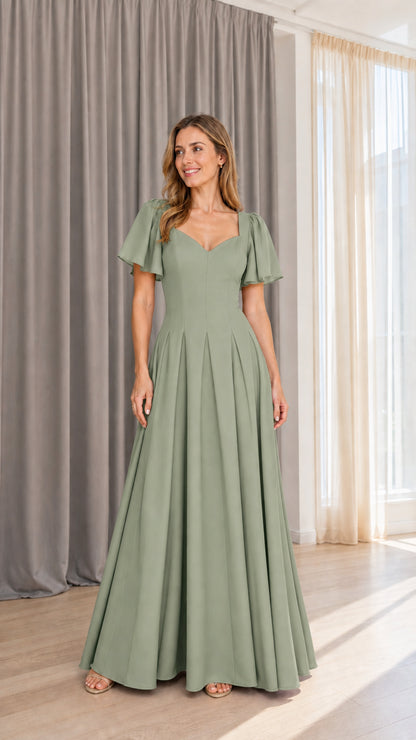 Front view of model wearing sage green formal maxi dress