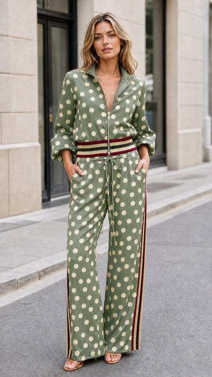 Full front view of woman wearing sage green polka dot two-piece pant set