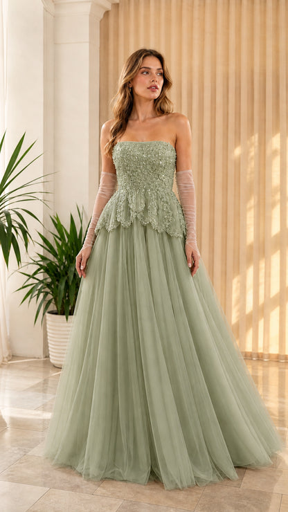 Full-length front view of sage green strapless beaded peplum tulle formal dress
