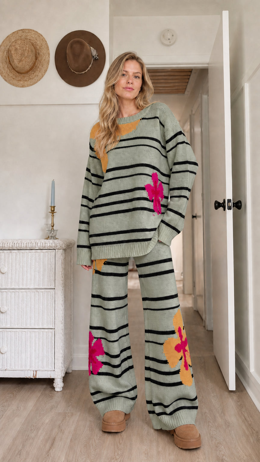 Model wearing sage green striped knit matching pullover and pants set