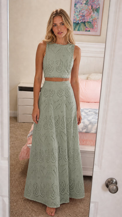 Front view of model wearing sage green eyelet two-piece set