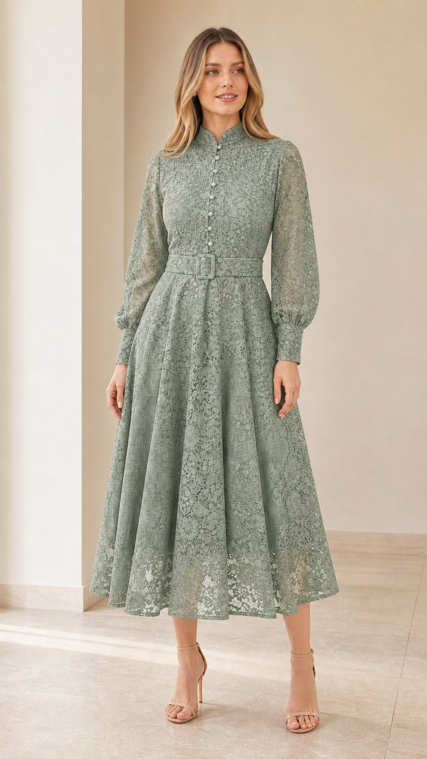Model wearing Sage Green lace midi dress with long sheer sleeves and belt
