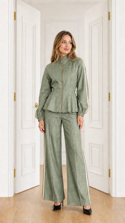 Full-length view of model wearing Sage Green peplum jacket and wide-leg pants set with cream side stripes