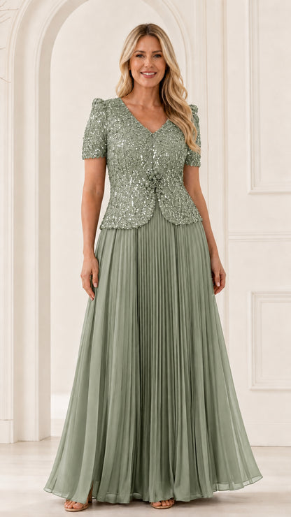 Full front view of sage green sequined short sleeve evening dress with pleated maxi skirt