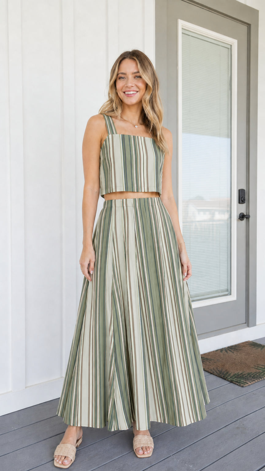 Woman wearing sage green striped two-piece set