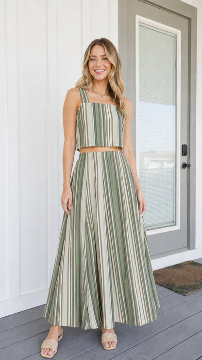 Woman wearing sage green striped two-piece set