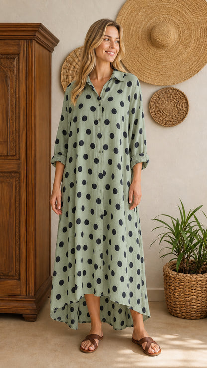 Front view of sage green polka dot maxi shirt dress on model