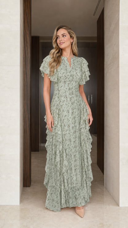 Model wearing sage green floral ruffle maxi dress
