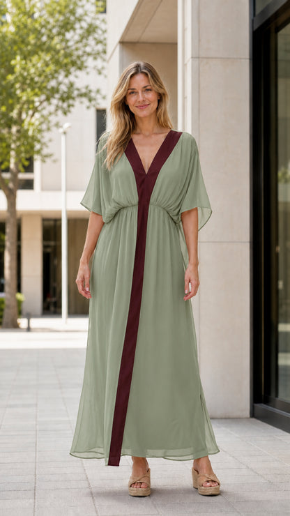 Front view of model wearing sage green maxi kaftan dress