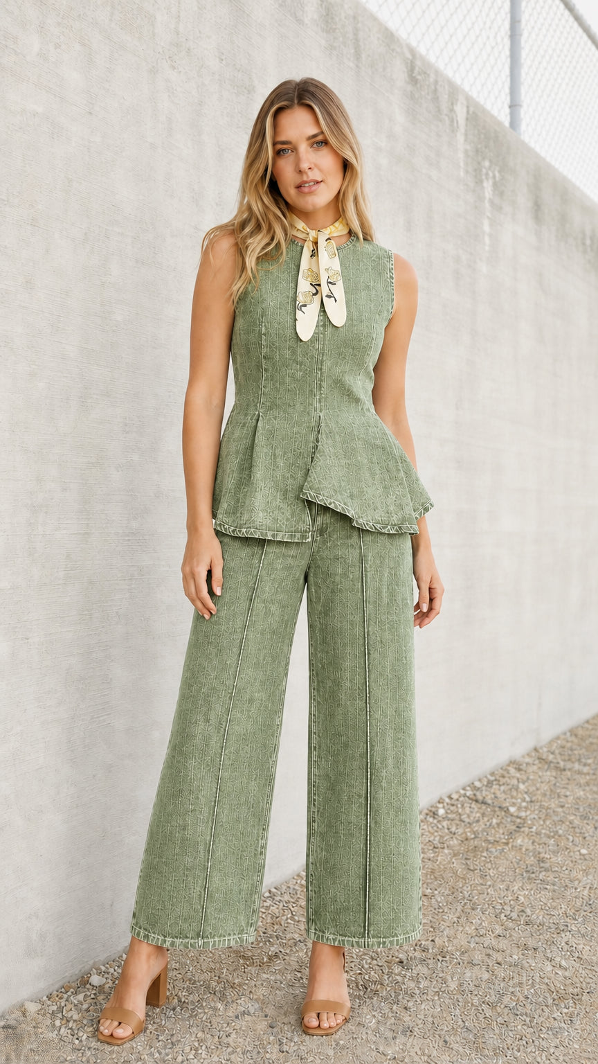 Front view of model wearing green denim peplum top and wide-leg pants set