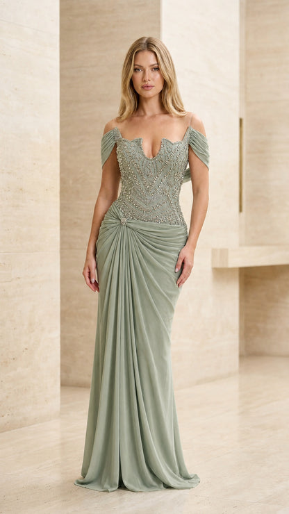 Model wearing sage green beaded off-the-shoulder formal evening dress