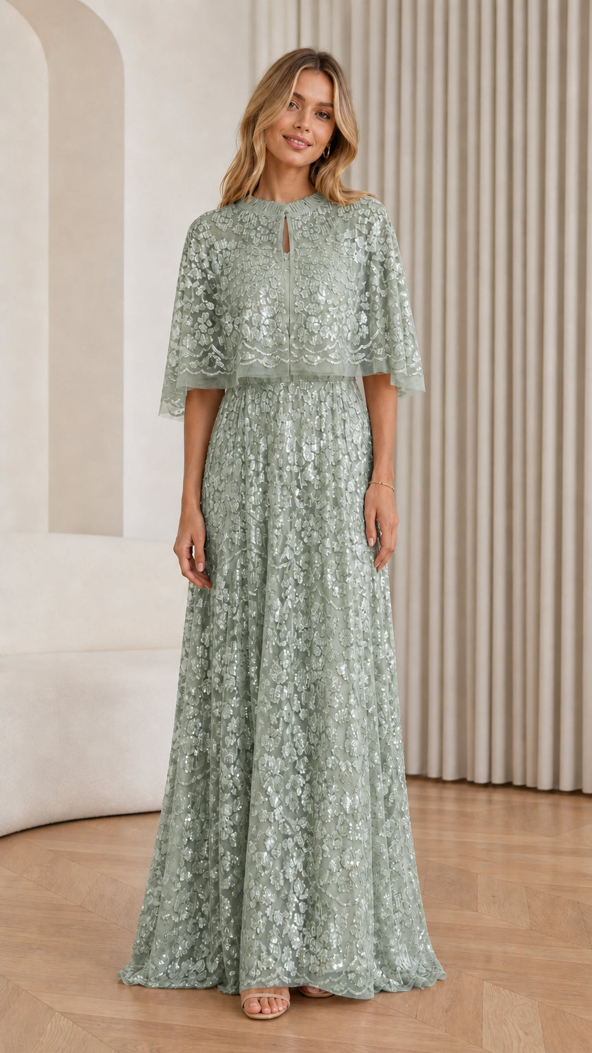 Front view of Sage Green sequin cape maxi dress on model