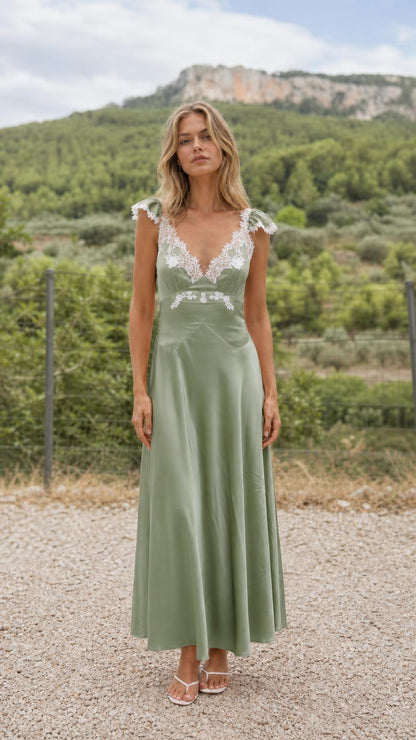 Front view of green lace trim satin maxi dress