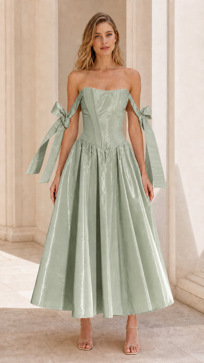 Model wearing Sage Green off-shoulder corset midi dress with ribbon details