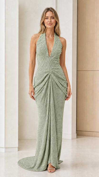Front view of sage green glitter halter evening dress