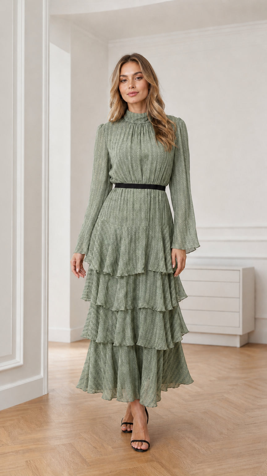 Model wearing sage green long sleeve tiered mock neck maxi dress