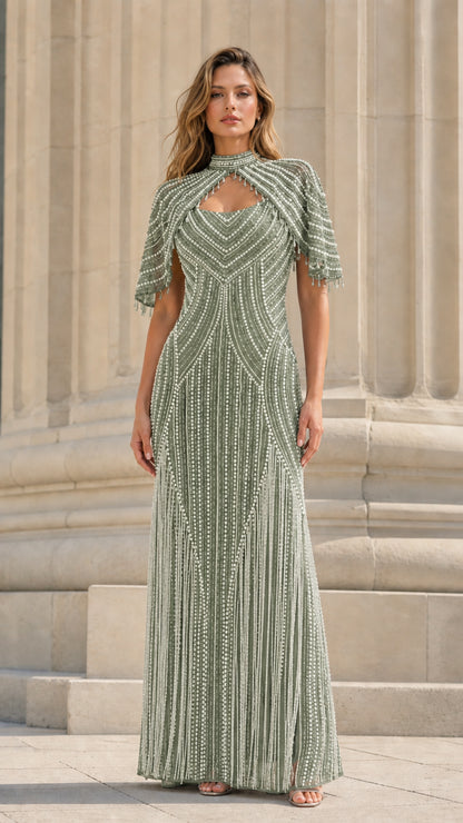 Model wearing sage green beaded evening gown