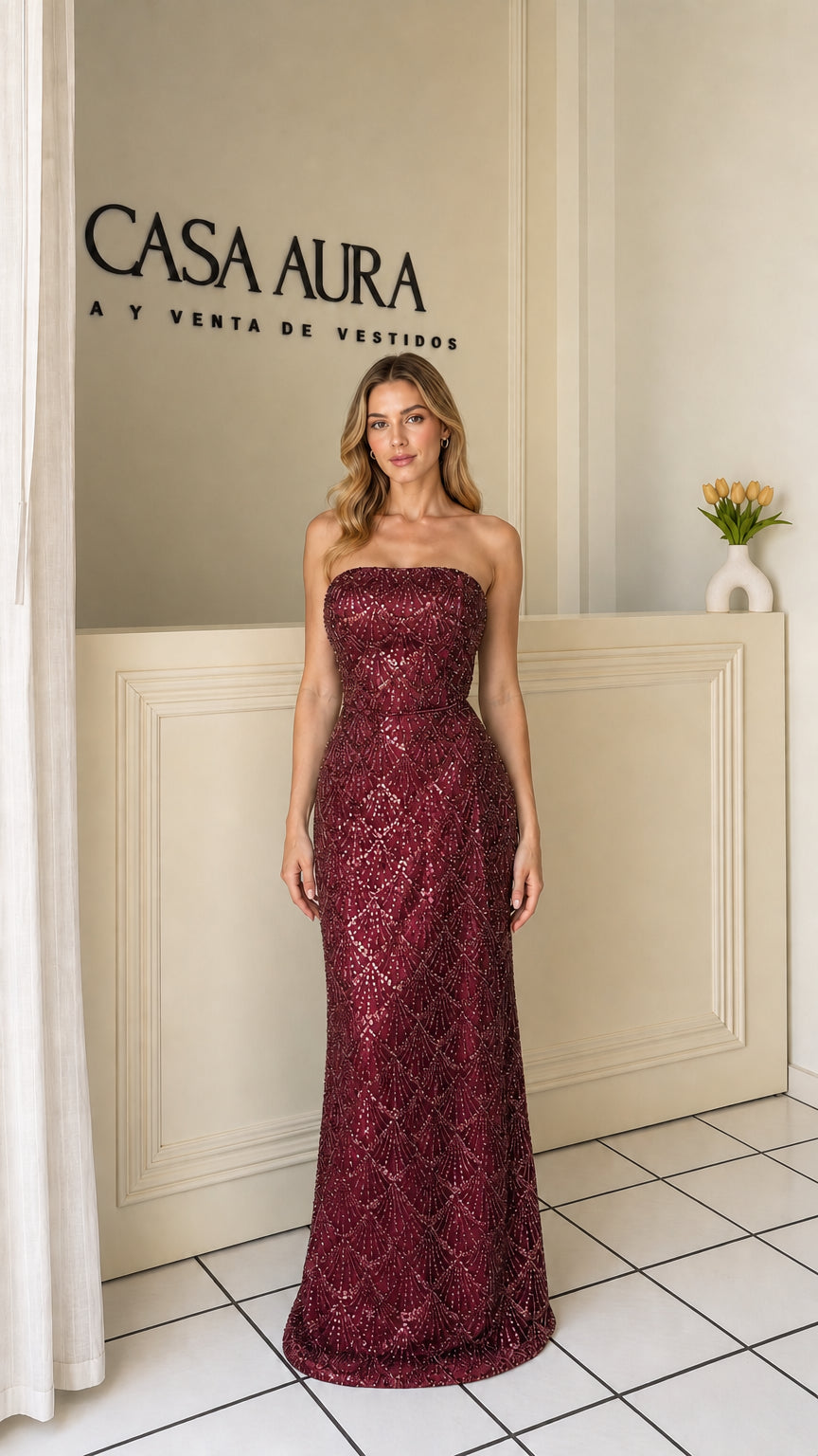 Model wearing burgundy strapless sequin evening dress