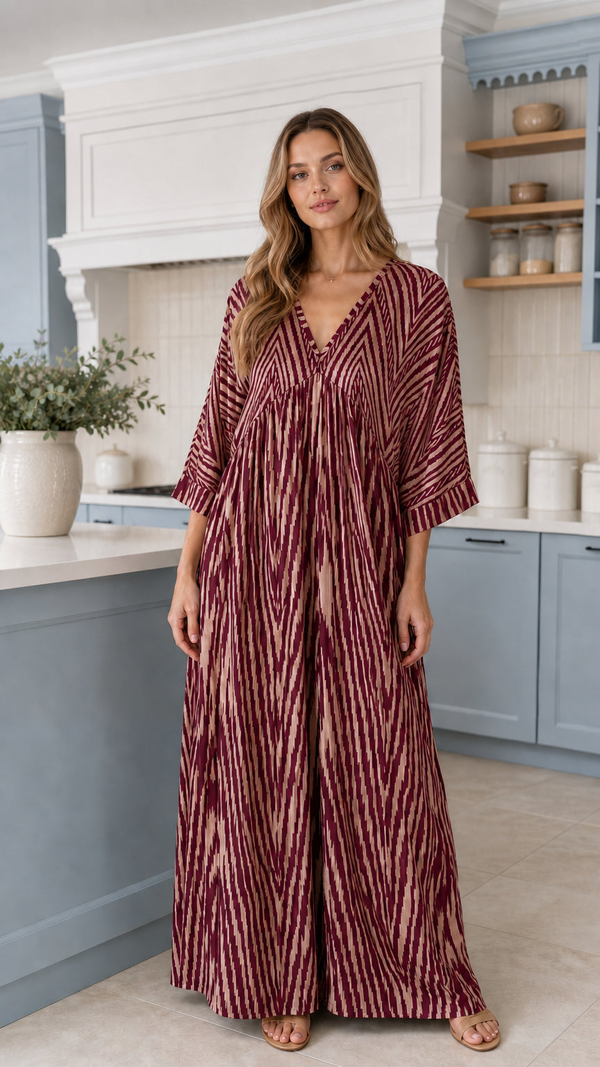 Front view of woman wearing Burgundy wine printed wide-leg maxi jumpsuit