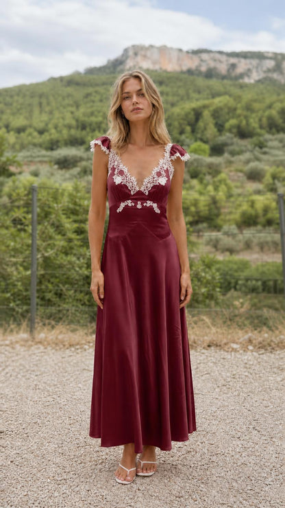 Front view of burgundy lace trim satin maxi dress
