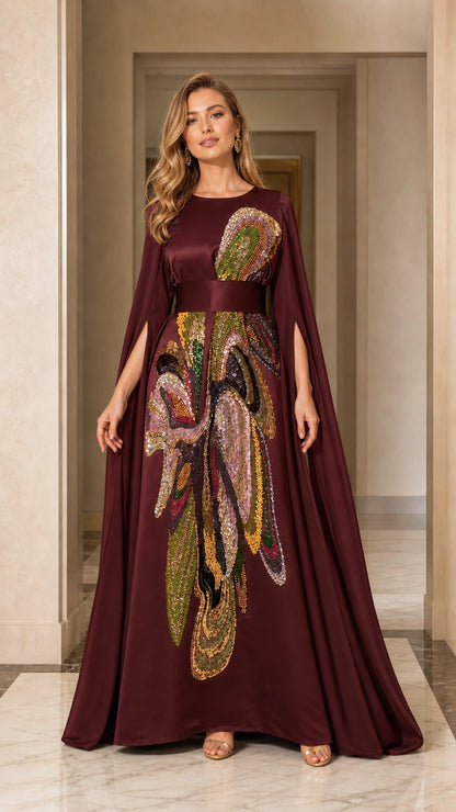 Front view of burgundy evening dress with cape sleeves