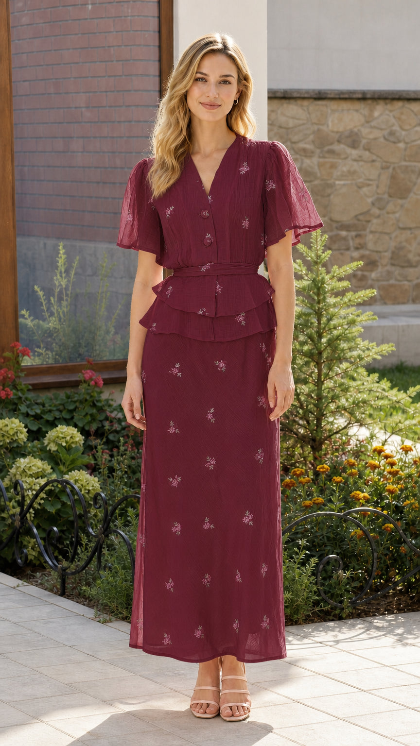 Front view of burgundy color variant of two-piece peplum maxi set