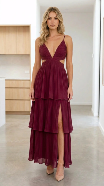 Front view of Burgundy pleated tiered cutout maxi dress