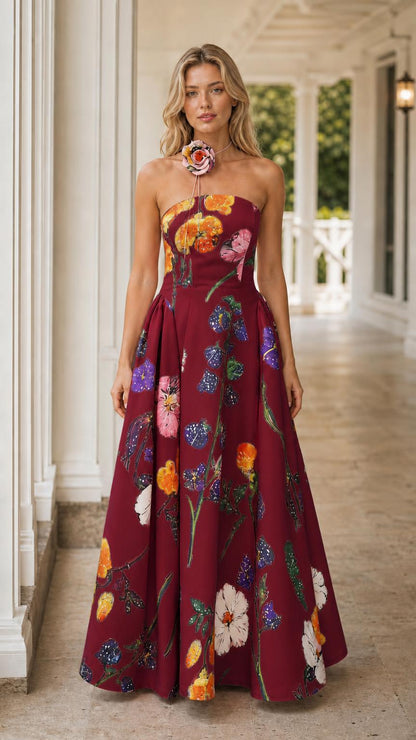 Front view of burgundy floral strapless maxi dress