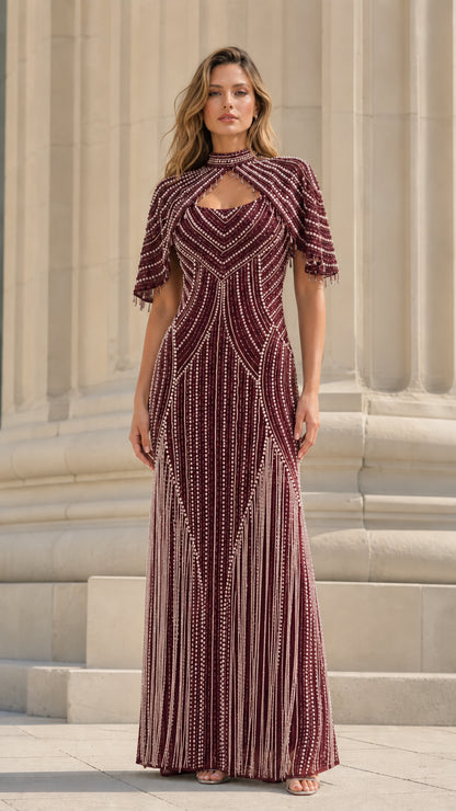 Model wearing burgundy beaded formal dress