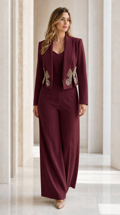Full length view of woman wearing burgundy wine formal embellished pant suit set