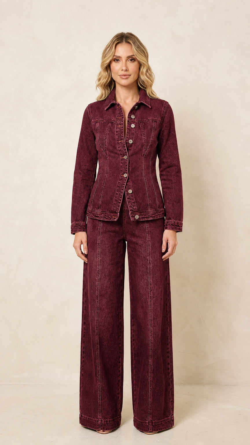 Front view of the women's burgundy denim-style jacket and wide-leg pants set