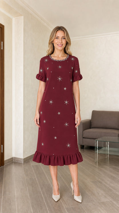 Model wearing burgundy embellished midi dress