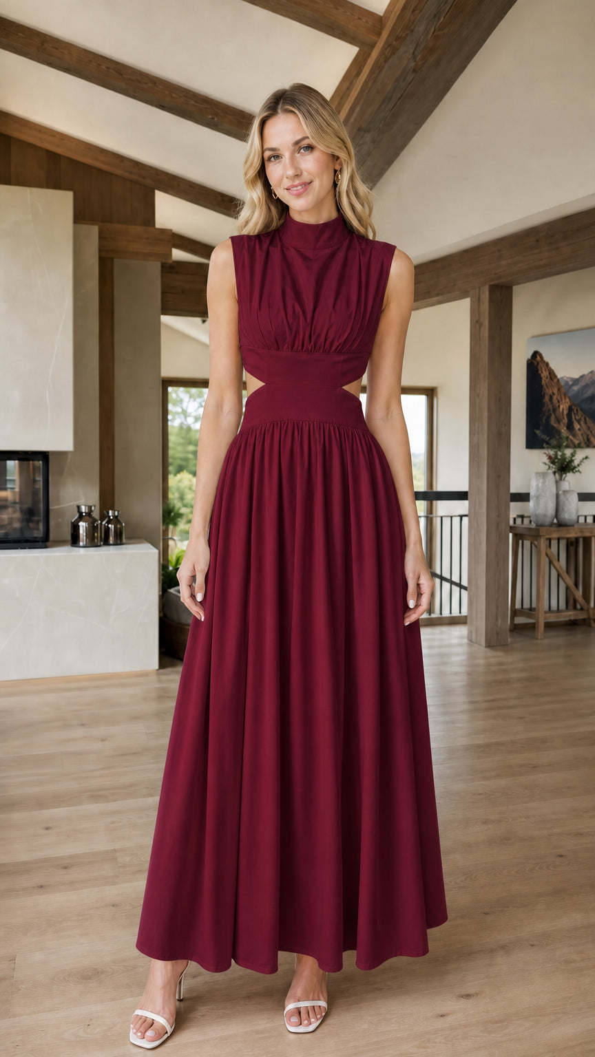 Front view of woman wearing burgundy cutout maxi dress