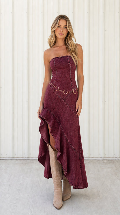 Front view of model wearing burgundy strapless denim dress