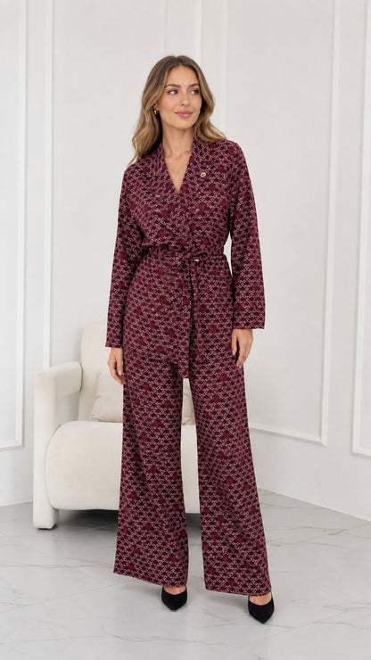 Model wearing burgundy wine geometric print belted pant suit