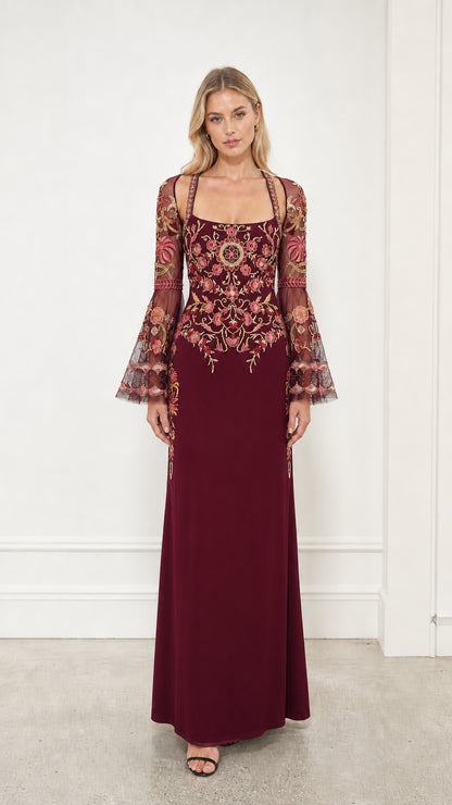 Front view of burgundy embroidered evening dress
