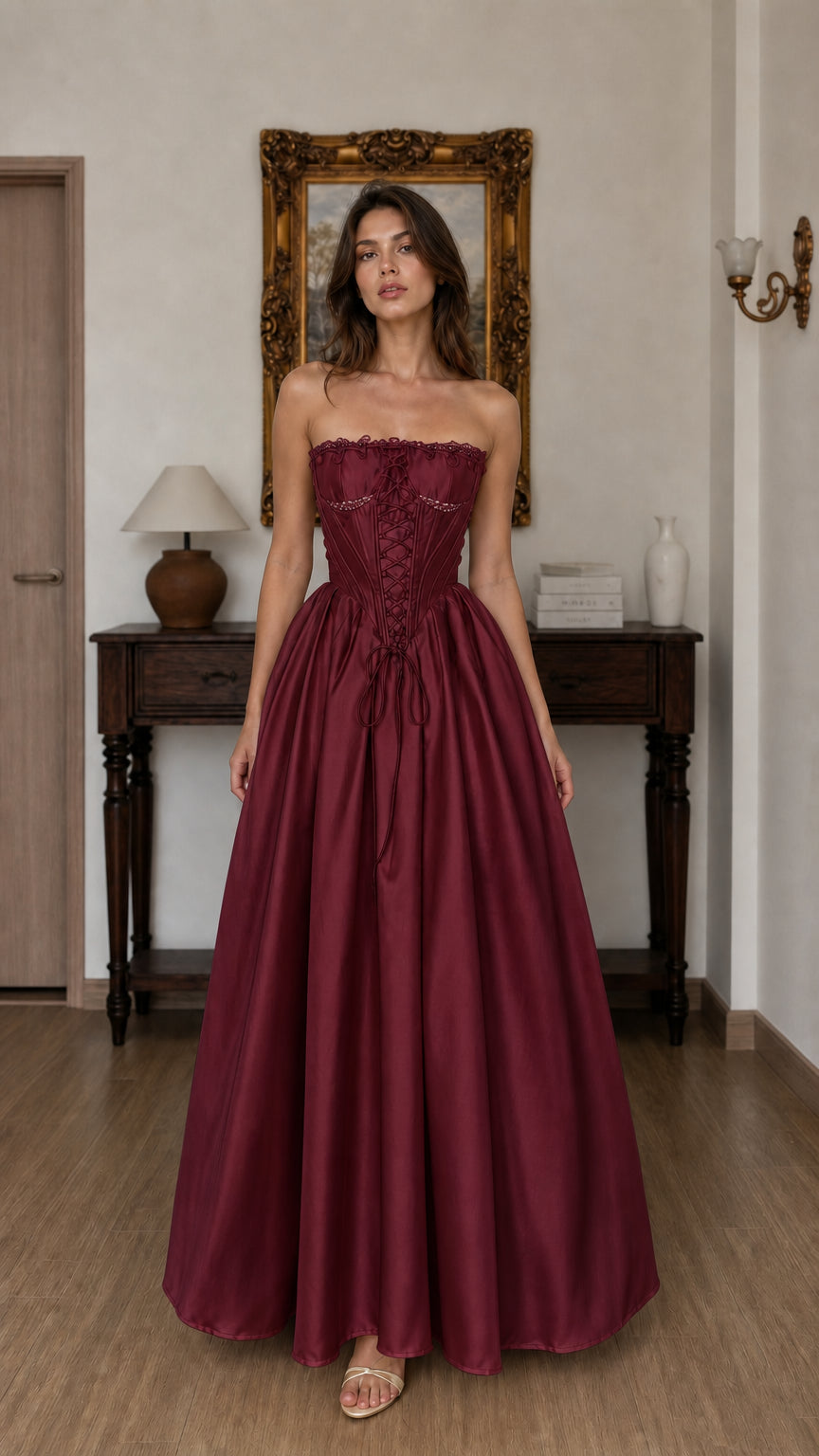 Front view of burgundy corset ball gown maxi dress