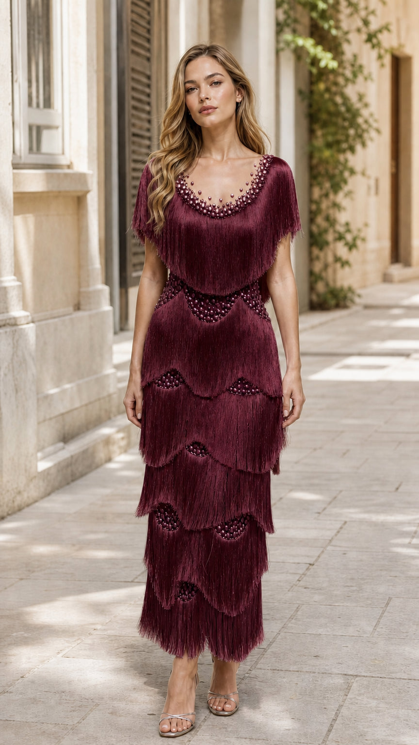 Front view of model in burgundy beaded fringe maxi dress