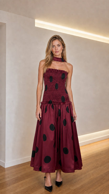 Model wearing burgundy polka dot midi dress variant