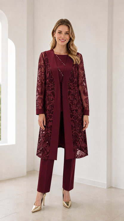 Model wearing burgundy 3-piece lace duster jacket and pants set